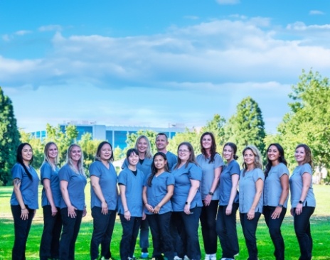 The Dentists at Orenco Station team members smiling outdoors