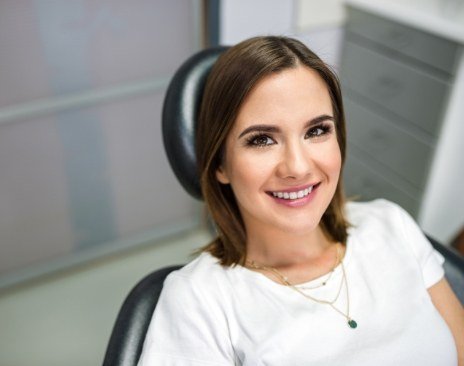 Smiling woman in dental chair