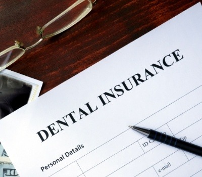 Dental insurance paperwork on a desk