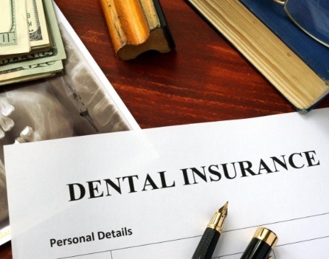 Dental insurance paperwork on desk