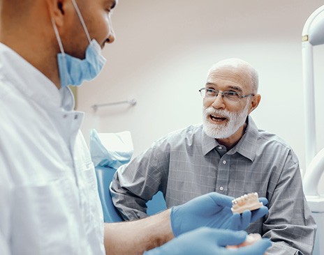 a patient during a dental implant consultation 