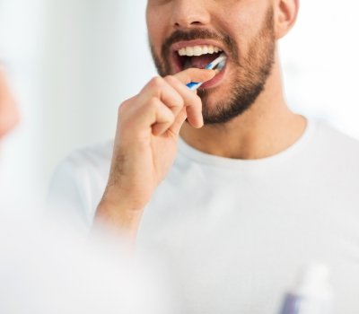 Man brushing his teeth