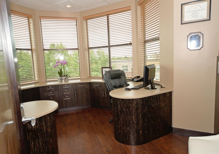 Desk with computer in consultation room