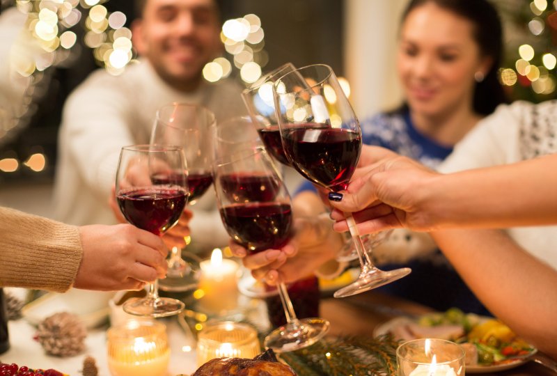 Friends toasting with red wine